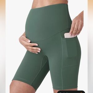 High-Waisted Green Maternity Yoga Biker Shorts with pockets
